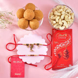 Regal Bhaiya Bhabhi Rakhi Hamper with Besan Laddoo, Lindt Chocolate & Cashew