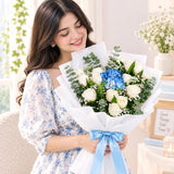12 White Roses & 4 Blue Spray Carnations Bouquet with Eucalyptus