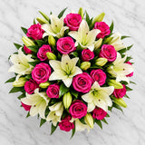 50 Pink Roses & 6 White Lilies Premium Glass Vase - Grand Anniversary Gift