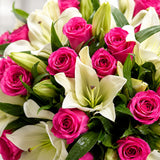 50 Pink Roses & 6 White Lilies Premium Glass Vase - Grand Anniversary Gift