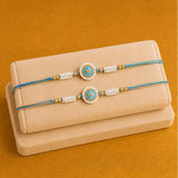 Set of 2 Meenakari Rakhi with Besan Laddoo & Almonds | Artisan Rakhi Hamper