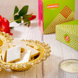 Vastu Kamdhenu Cow with Gold Emblishment with Ethnic Handcrafted Bag with Sweets