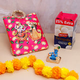 Mini Idol Makhan Chor Krishna Idol with Ethnic Handcrafted Bag with Sweets