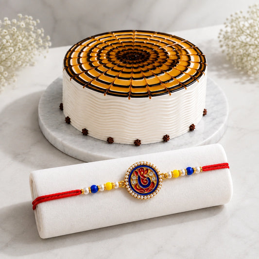 1 Ganesha Rakhi With Golden Butterscotch Fantasy Cream Cake