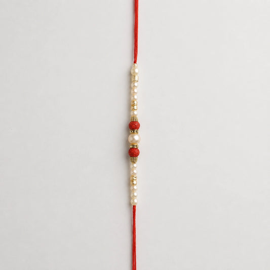 Pearl Rakhi with Kaju Roll & Almonds | Traditional Raksha Bandhan Sweet Hamper