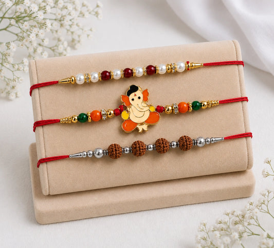 Pearl, Rudraksha & Ganesha Rakhi with Kaju Roll & Almonds | Family Rakhi Hamper