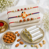 Pearl, Rudraksha & Ganesha Rakhi with Kaju Roll & Almonds | Family Rakhi Hamper