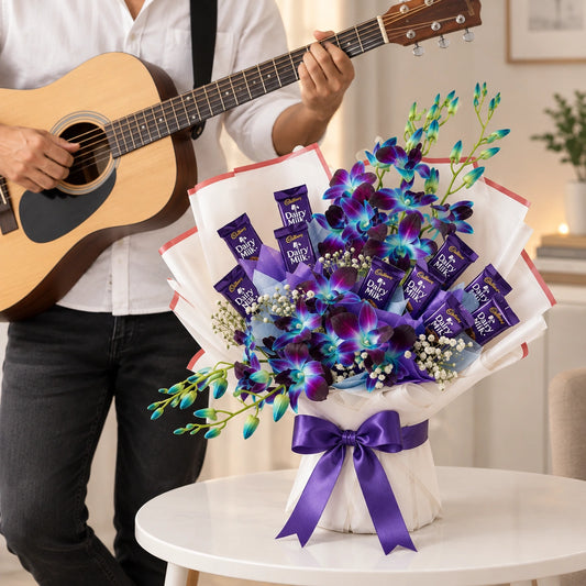 Blue Orchids & Dairy Milk Chocolate Bouquet with Guitarist