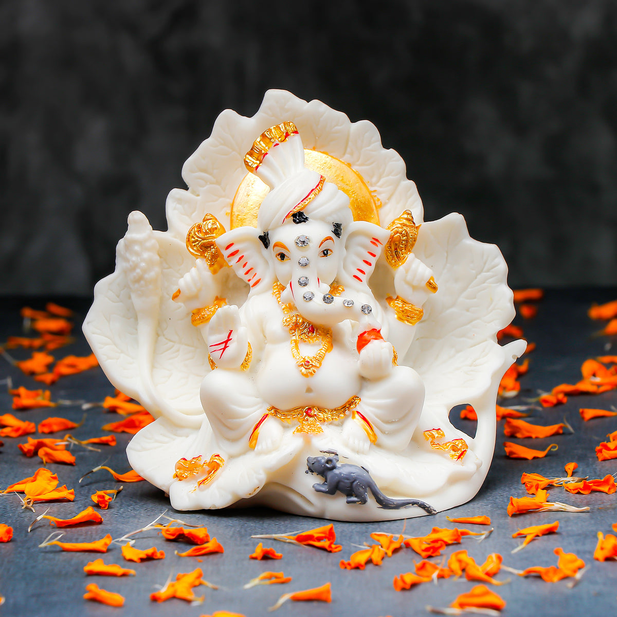 White Ganeha Idol with Golden Accents
