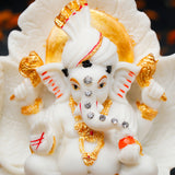 White Ganeha Idol with Golden Accents