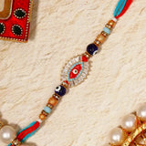 Evil Eye Rakhi with 01 Musk Perfume, Rasgulla and Evil Eye Keychain