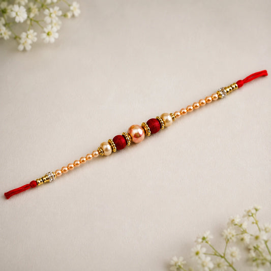 Velvety Pearl Rakhi With Rasgulla Delights