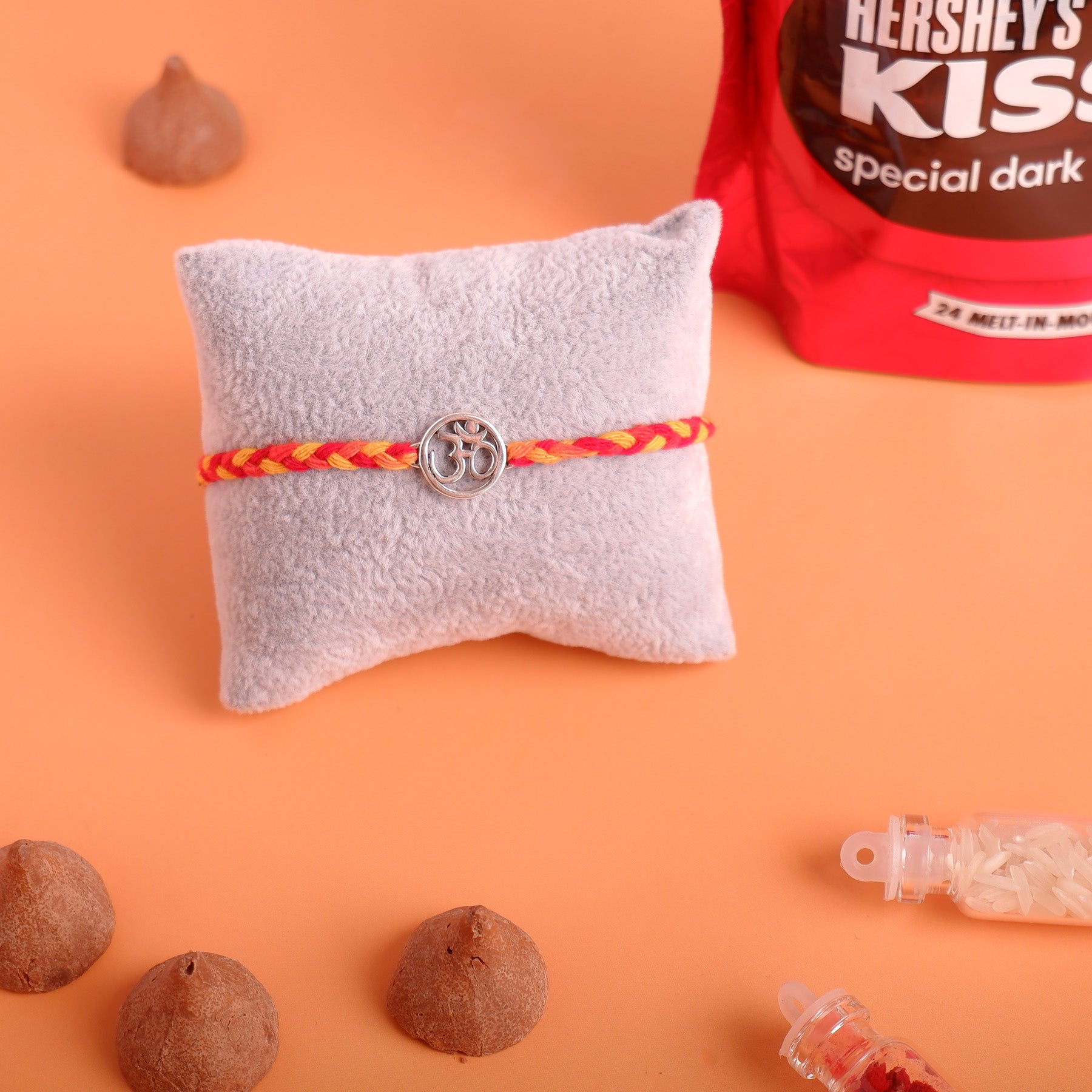 Shree OM Silver Rakhi with Hersheys Kisses Dark n Almonds Chocolate 100 GM