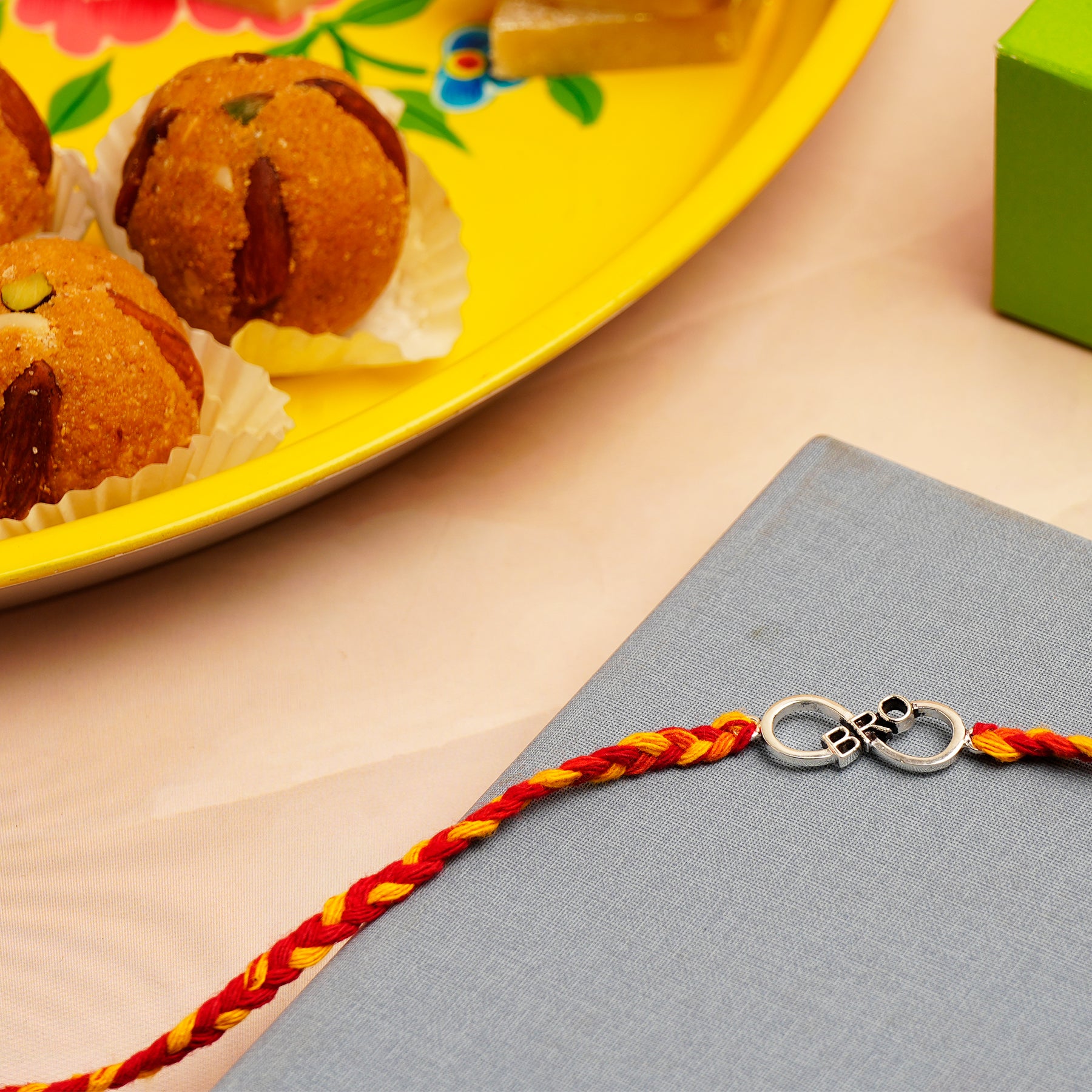 Infinite Bro Silver Rakhi with Besan Ladoo