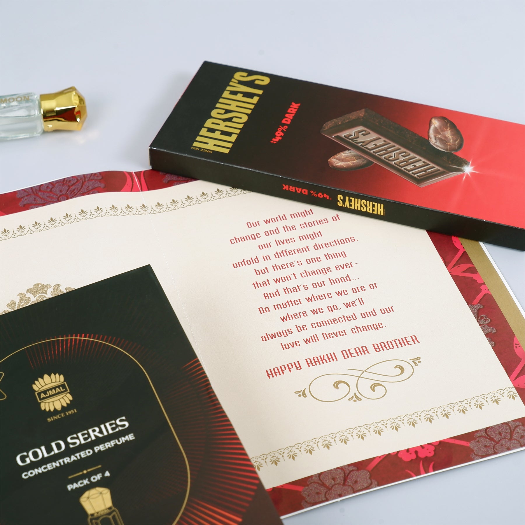 Ajmal Gold Series Perfume with Rakhi Greeting Card and Hersheys Chocolate Bar