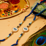 Blue Evil Eye Rakhi with Hersheys Kisses Hazelnut n Cookies