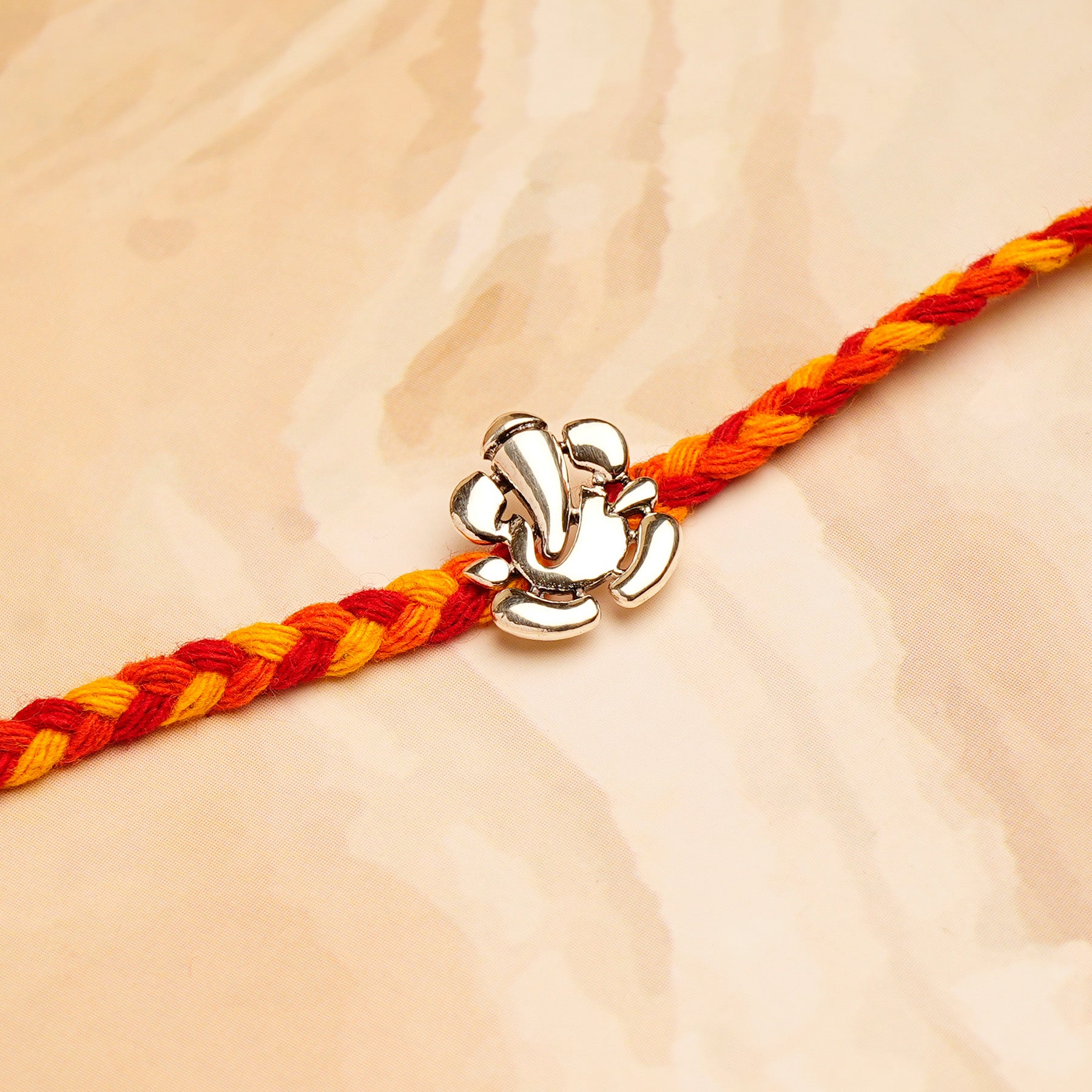 Ganesha Silver Rakhi with Ferrero Rocher Gift Box