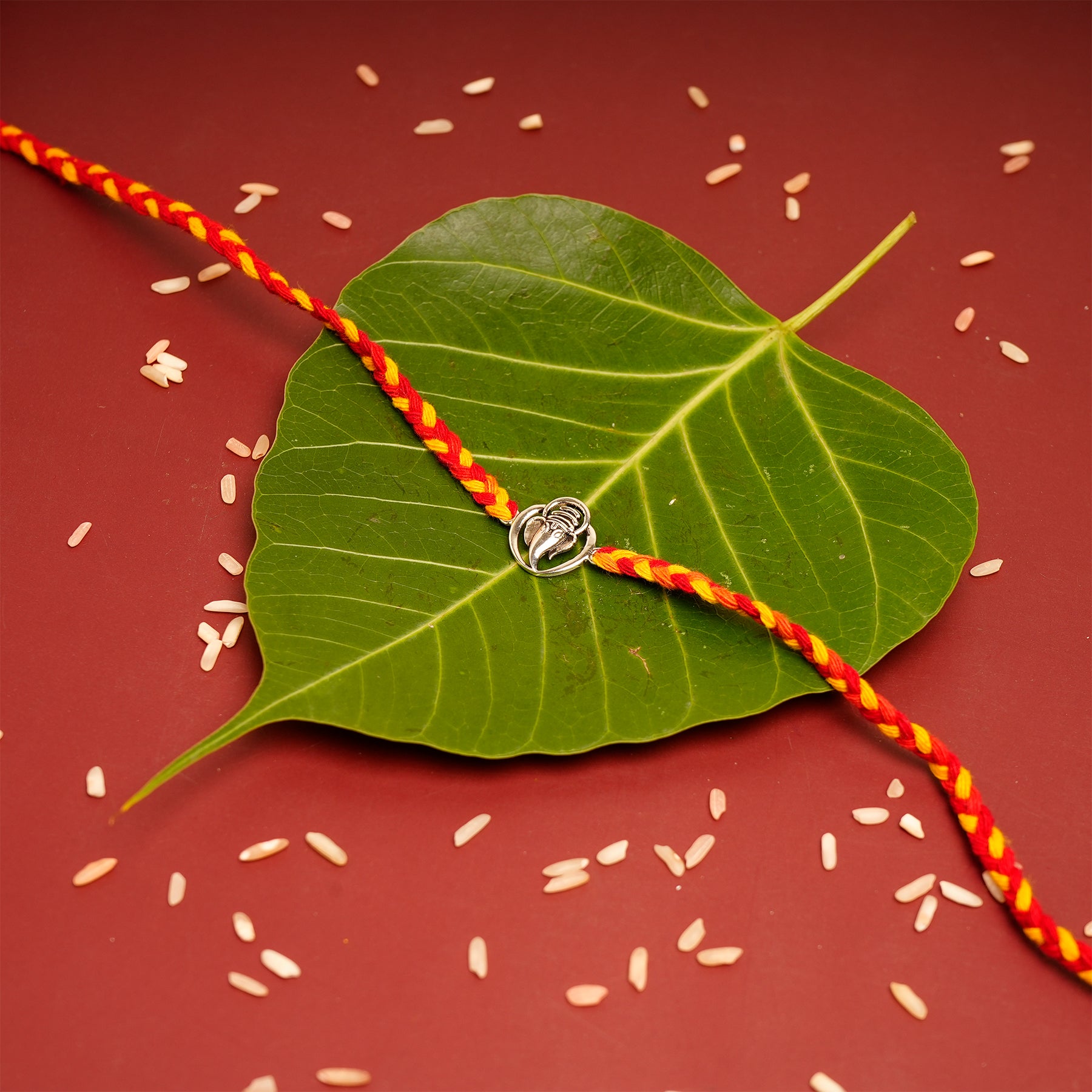 Sacred Ganesha Premium Silver Rakhi