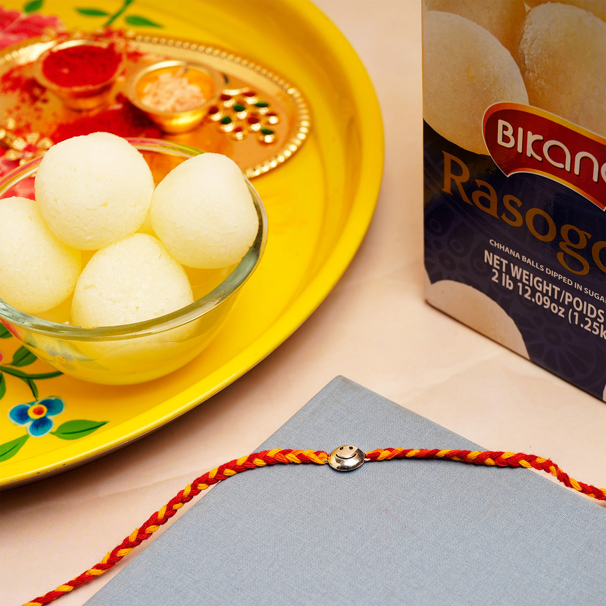 Smiley Rakhi with Rasgulla