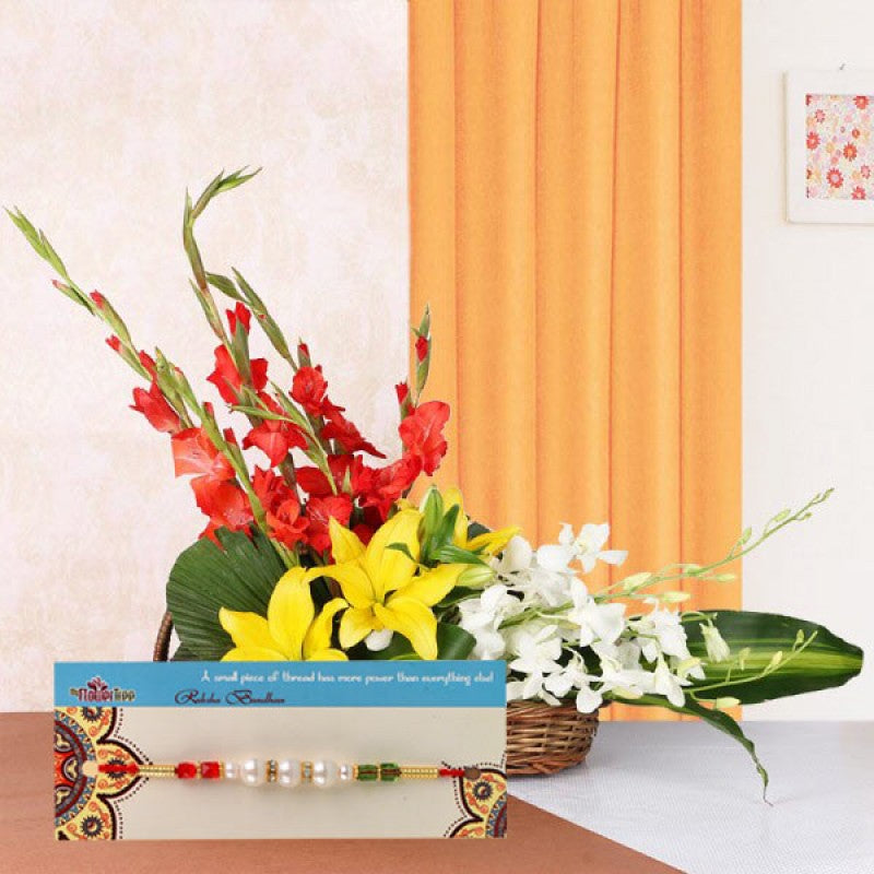 Single Pearl Rakhi with Floral Basket Arrangement