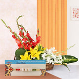 Single Pearl Rakhi with Floral Basket Arrangement
