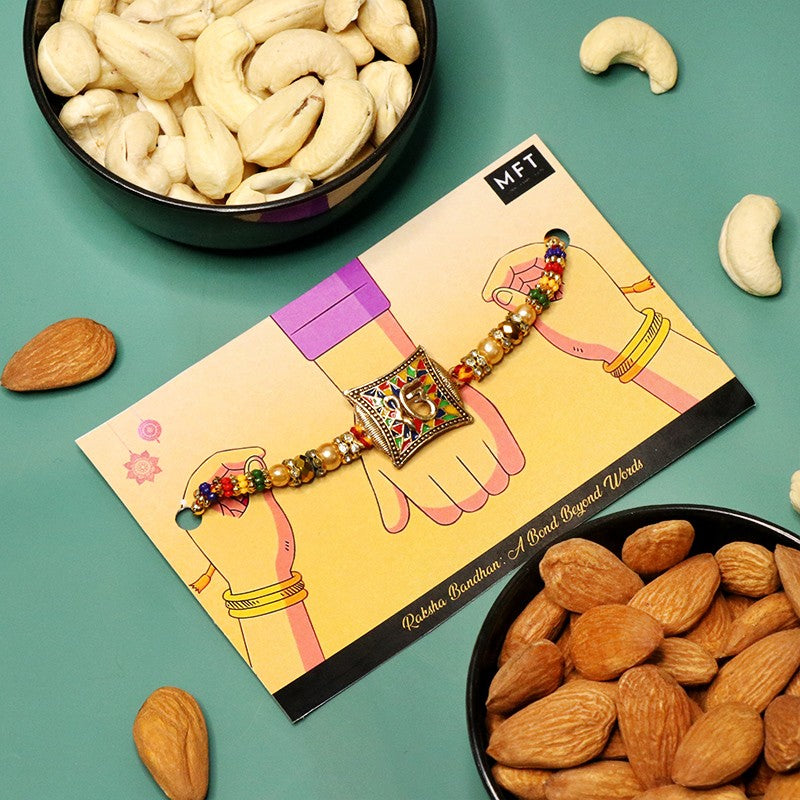 Omkar Rakhi with Almonds, Cashews, Roli & Chawal