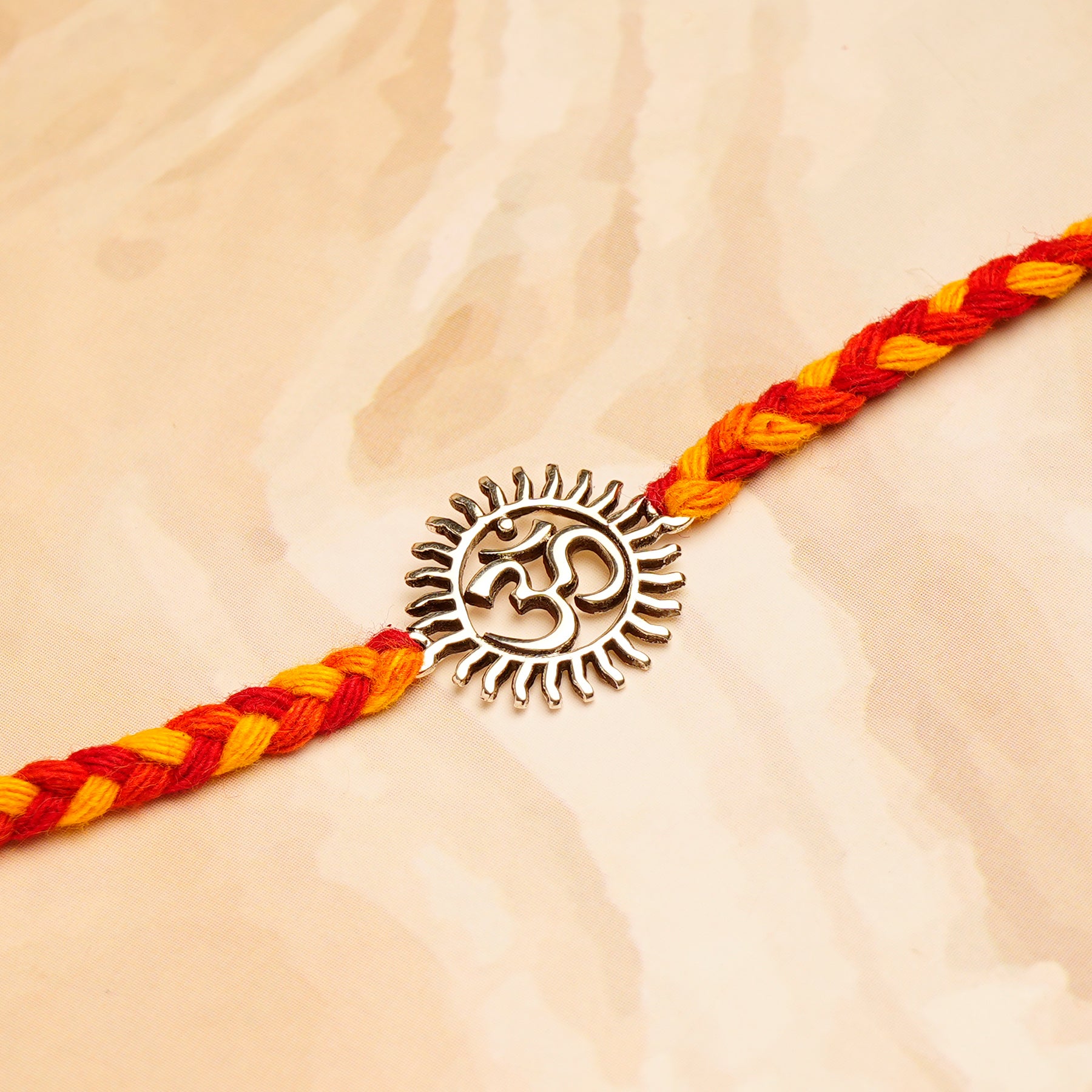 OM Premium Silver Rakhi