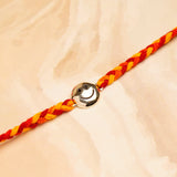 Smiley Silver Rakhi with Hersheys Kisses Hazelnut n Cookies