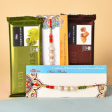 Set of 2 Pearl Rakhi with 2 Cadbury Temptations, Roli & Chawal