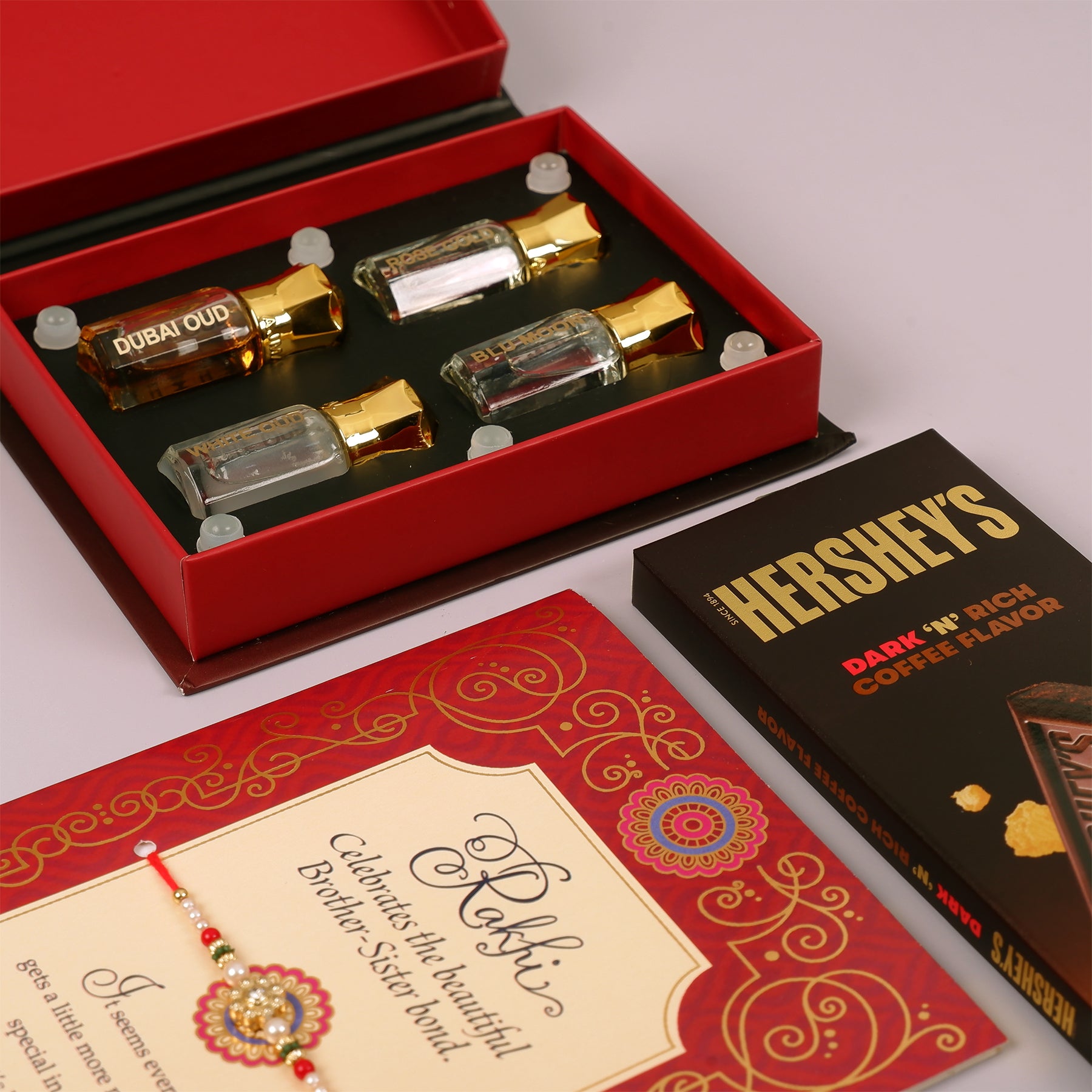 Ajmal Gold Series Perfume with Rakhi Greeting Card and Hersheys Coffee Bar