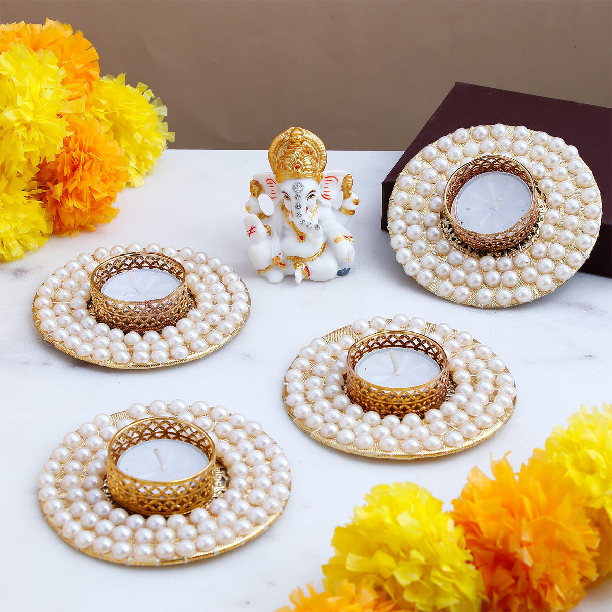 Om Ganesha Idol with Pearl Diya Pack of 4