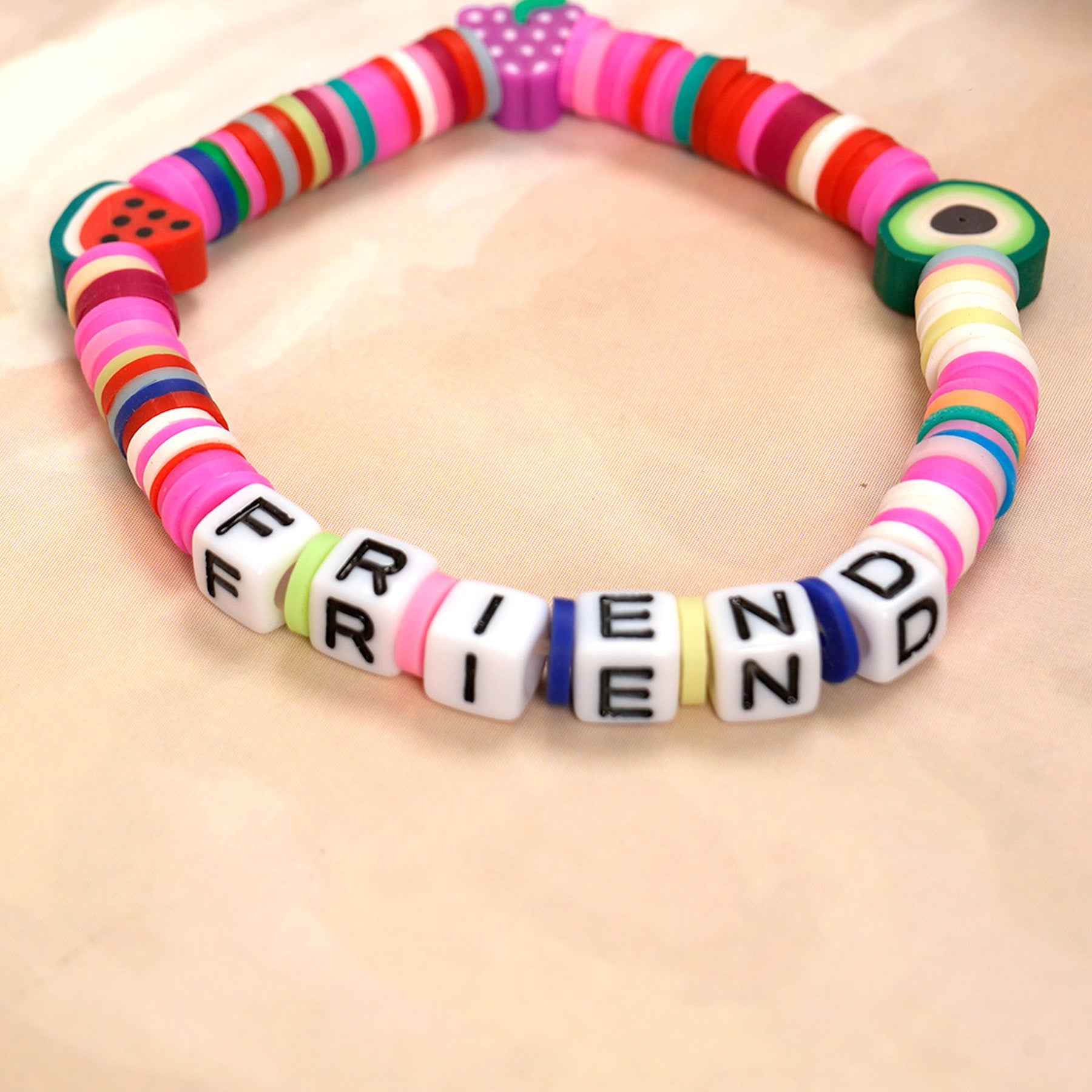 Pink Tone Loop Fruit Bead Friendship Bracelet