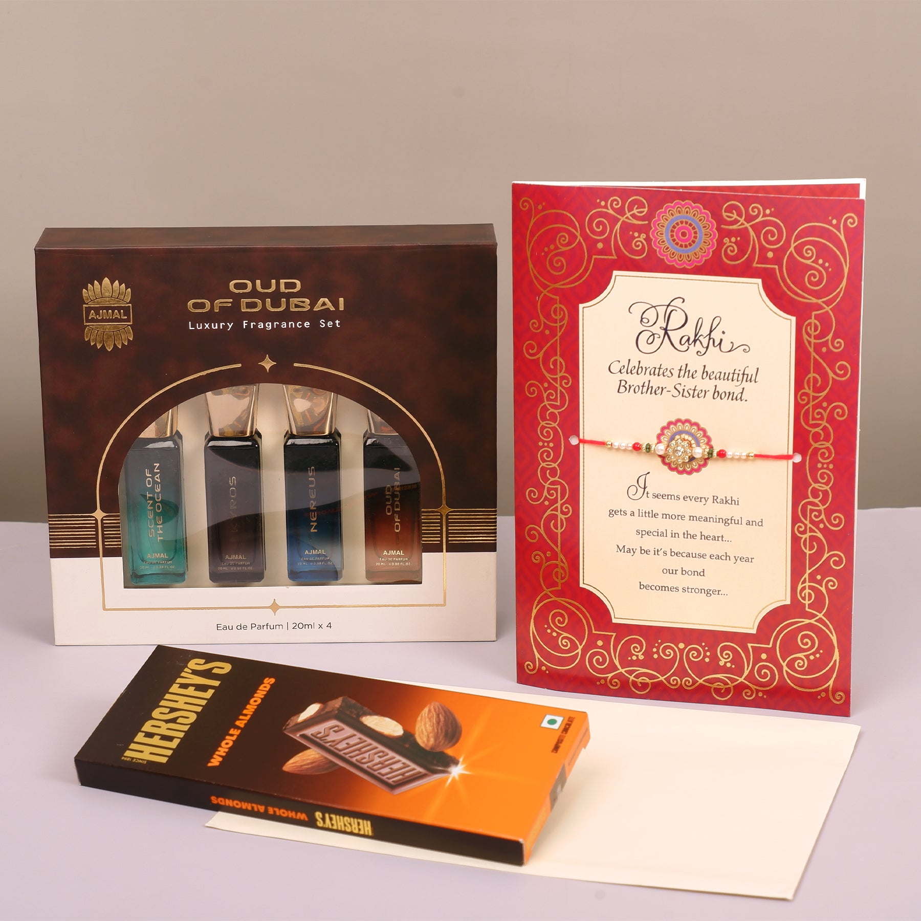 Oud Of Dubai Perfume with Rakhi Greeting Card and Hersheys Almond Bar