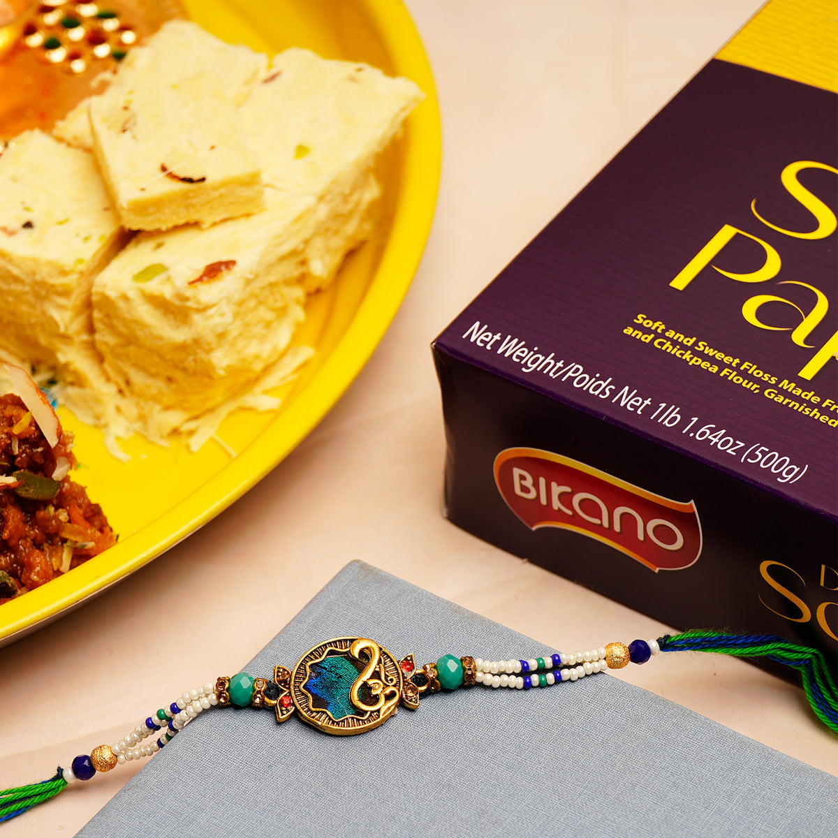 OM Rakhi with Dhoda Barfi