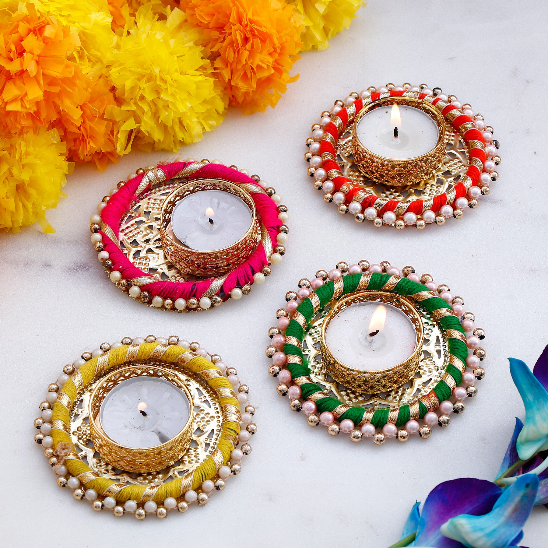 Om Ganesha Idol with Handcrafted Diya Pack of 4