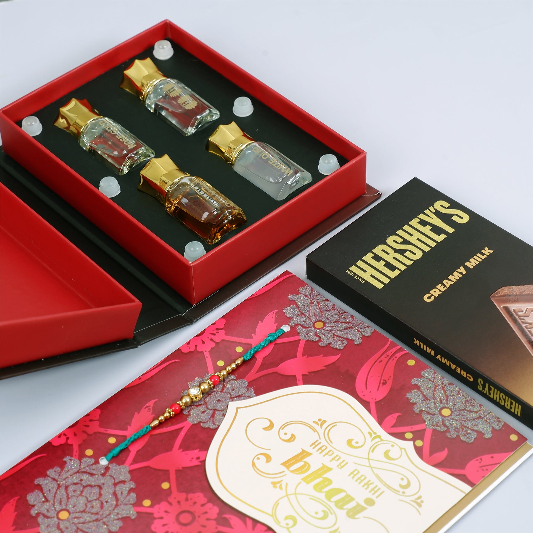Ajmal Gold Series Perfume with Rakhi Greeting Card and Hersheys Chocolate