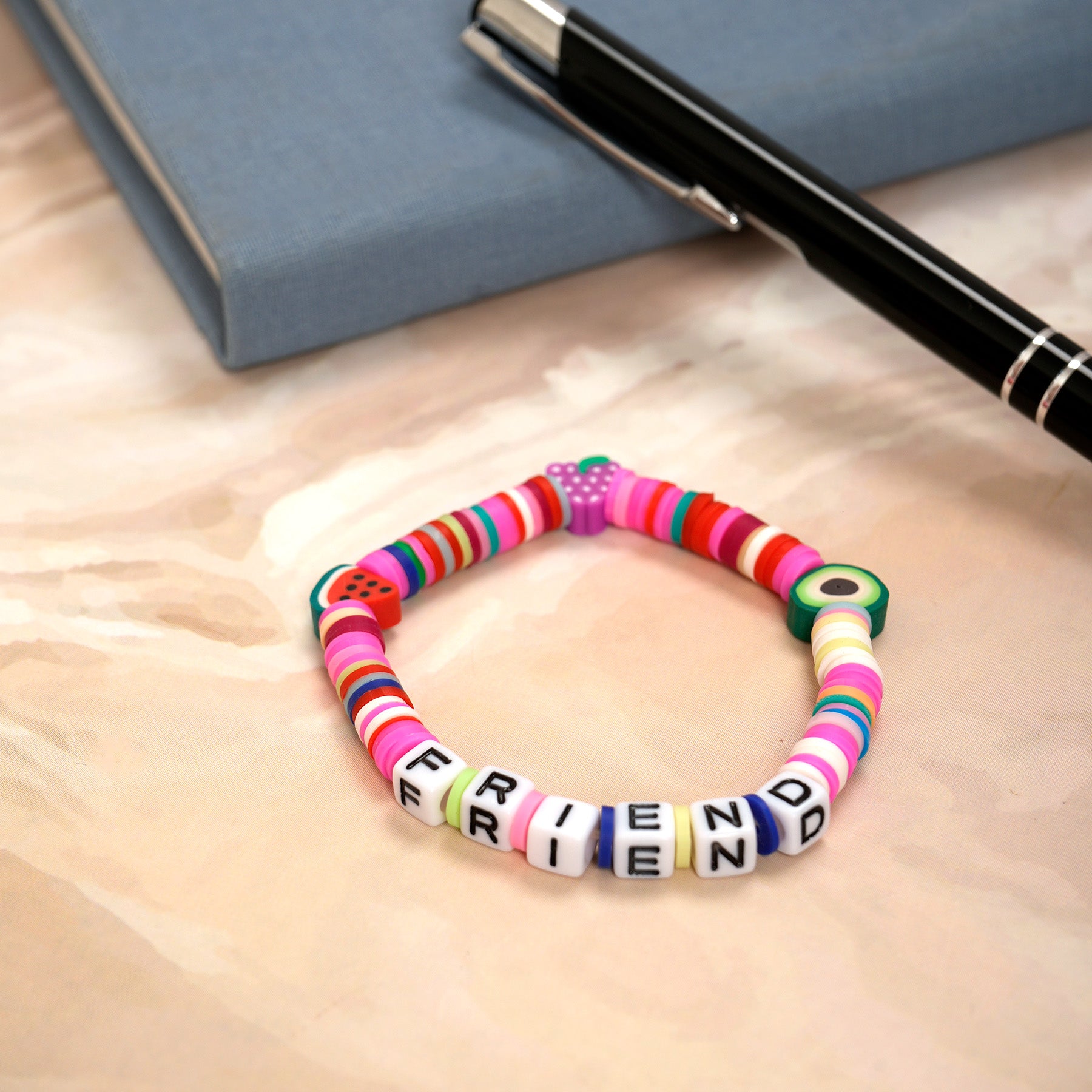 Pink Tone Loop Fruit Bead Friendship Bracelet