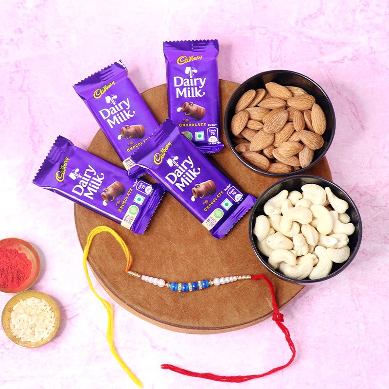 Pearl Rakhi with Almonds, Cashews, 4 Dairy Milk, Roli & Chawal