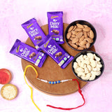 Pearl Rakhi with Almonds, Cashews, 4 Dairy Milk, Roli & Chawal