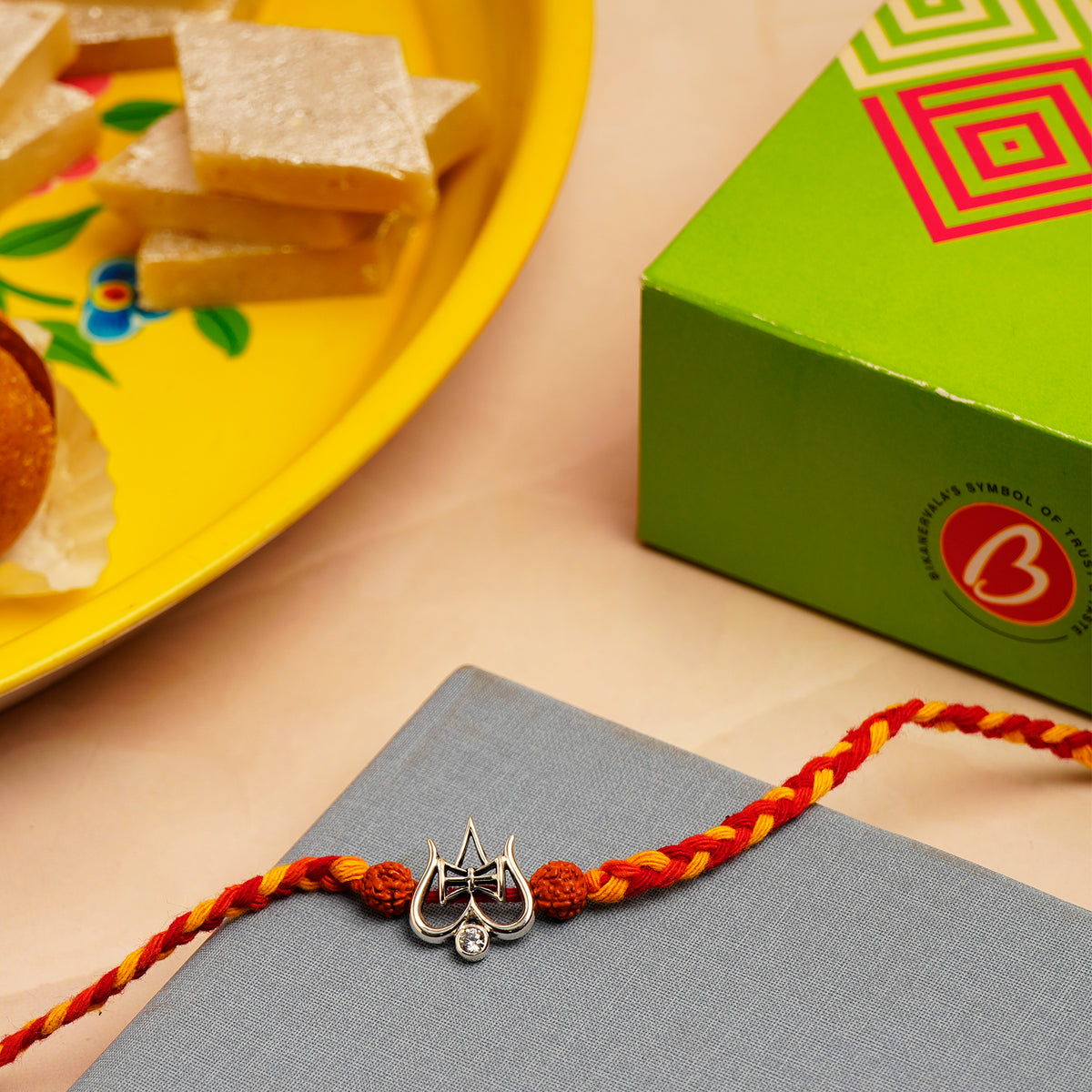 Trishul Silver Rakhi with Kaju Barfi