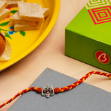 Trishul Silver Rakhi with Kaju Barfi