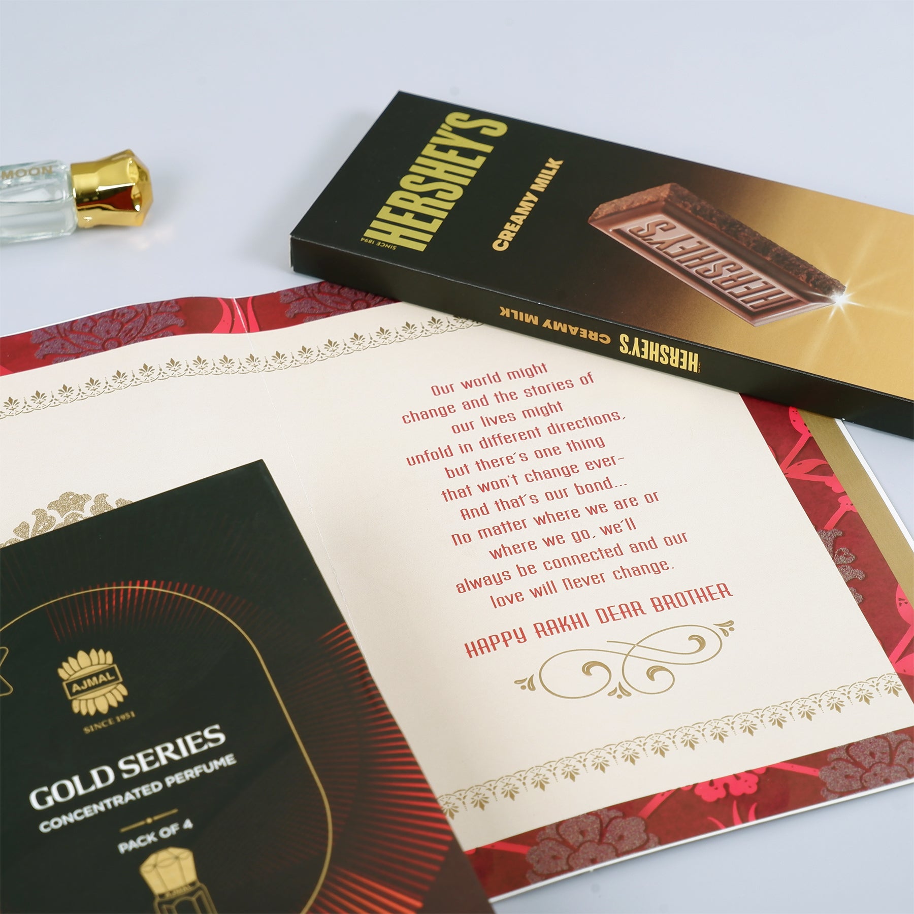 Ajmal Gold Series Perfume with Rakhi Greeting Card and Hersheys Chocolate