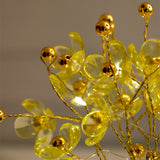 Yellow Blossoms in Crystal Vase