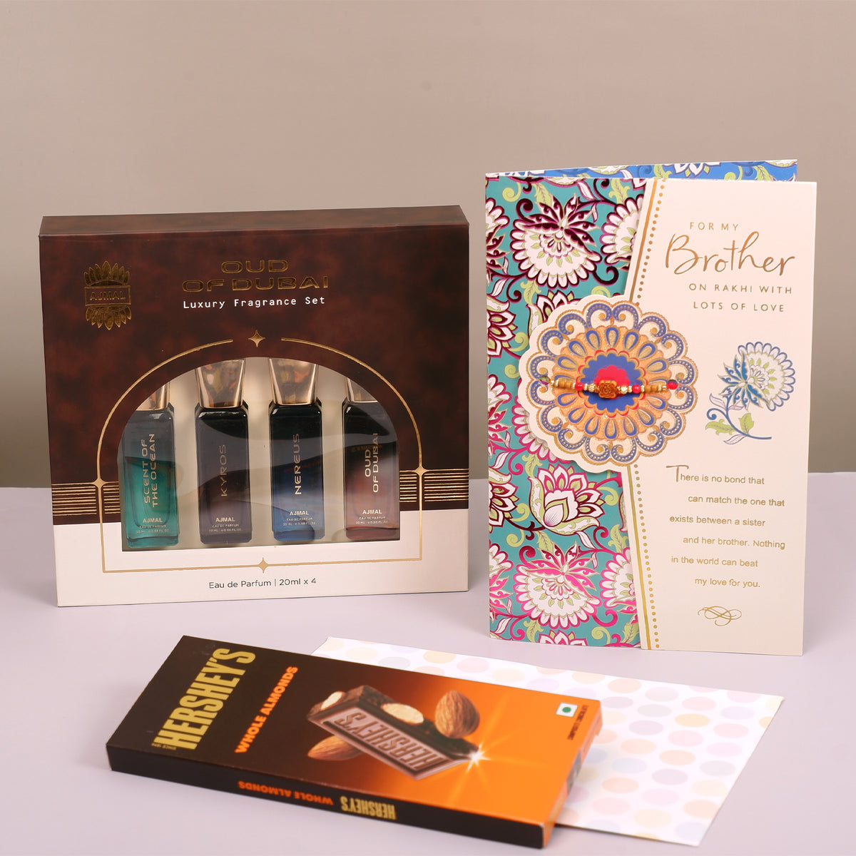 Oud Of Dubai Perfume with Rakhi Greeting Card and Hersheys Bar