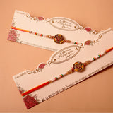 Traditional OM Rakhi  with Hersheys Kisses Dark n Almonds Chocolate 100 GM