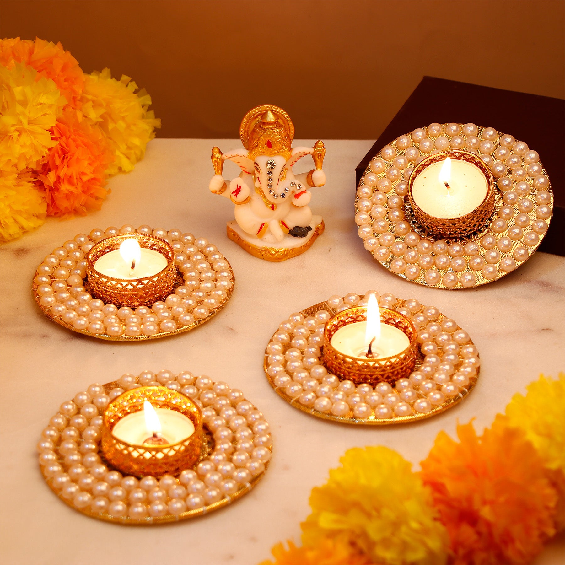 Lord Ganesha Idol with Pearl Diya Pack of 4