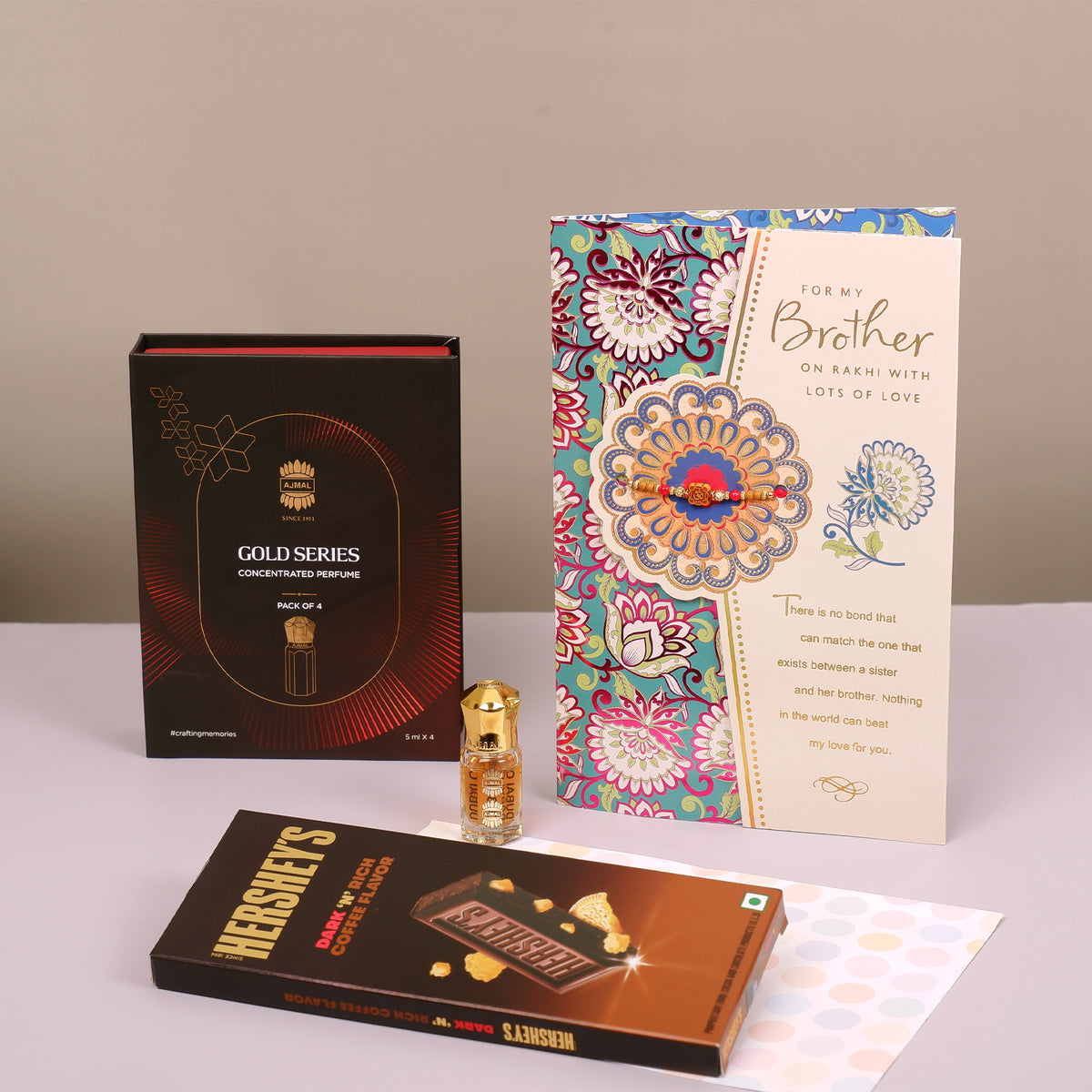 Ajmal Gold Series Perfume with Rakhi Greeting Card and Hersheys Coffee Chocolate