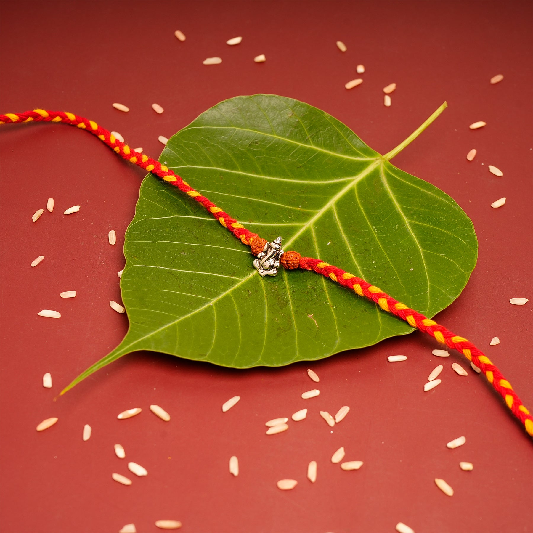 Shree Ganesha Premium Silver Rakhi
