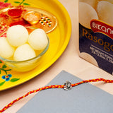 Ganesha Silver Rakhi with Rasgulla