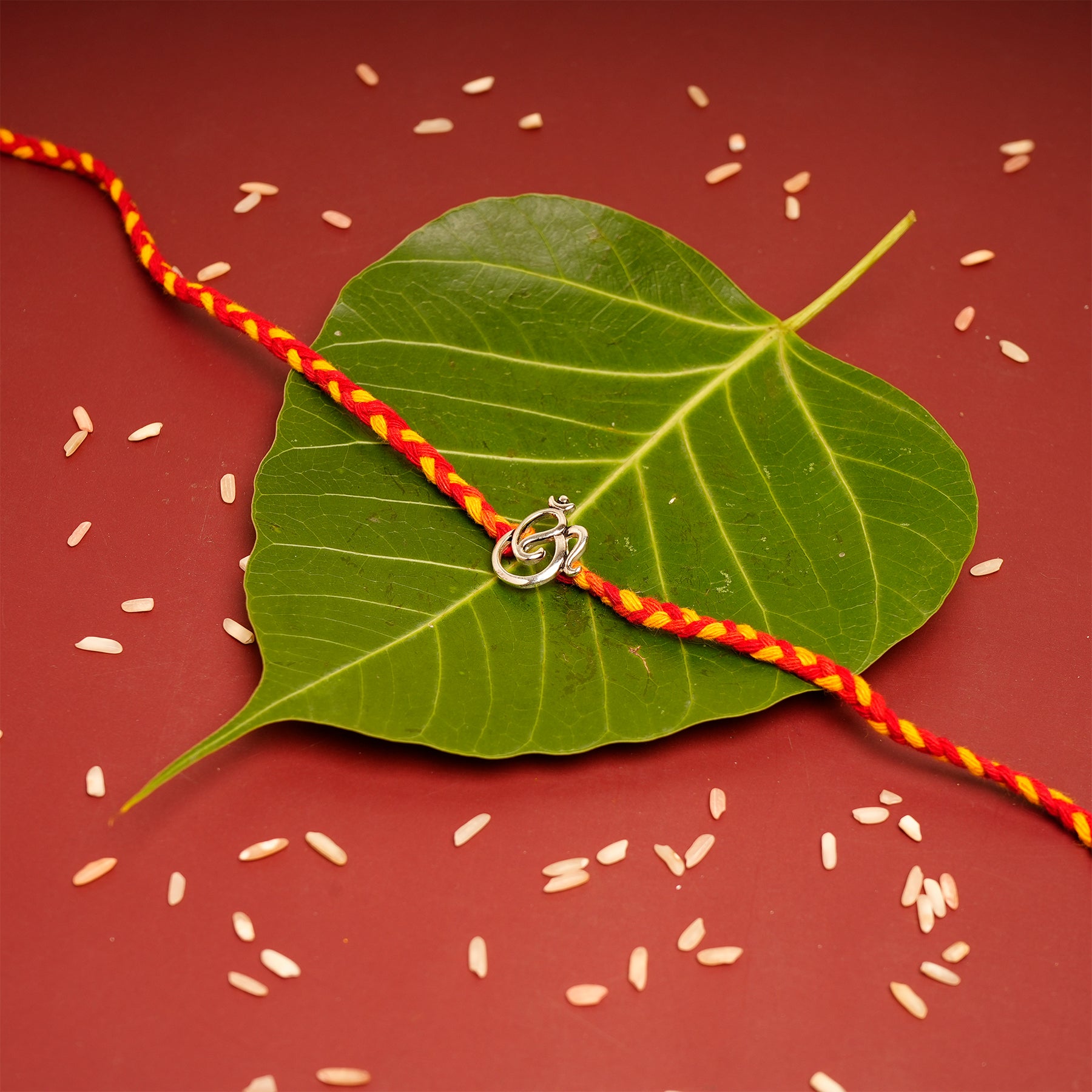 OM Ganesha Premium Silver Rakhi